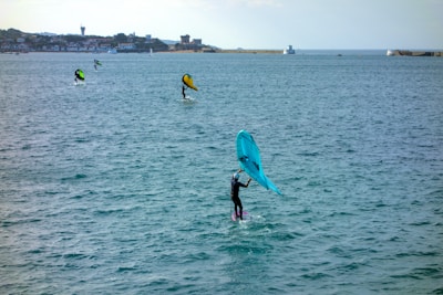 wing foilers at a popular ocean harbor