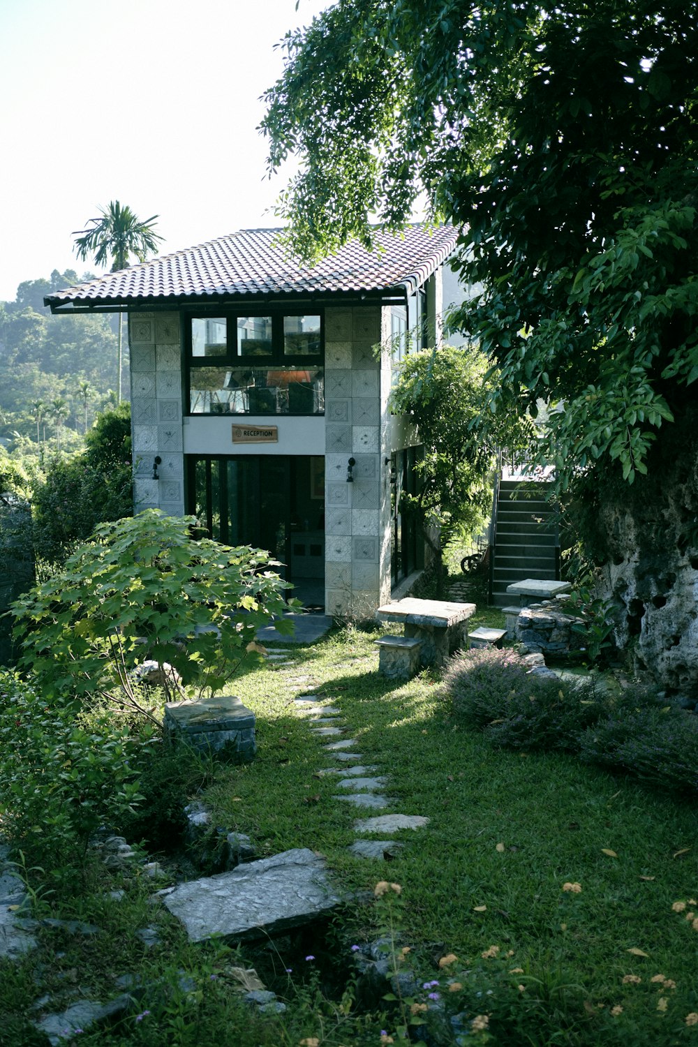 a building with a garden in front of it