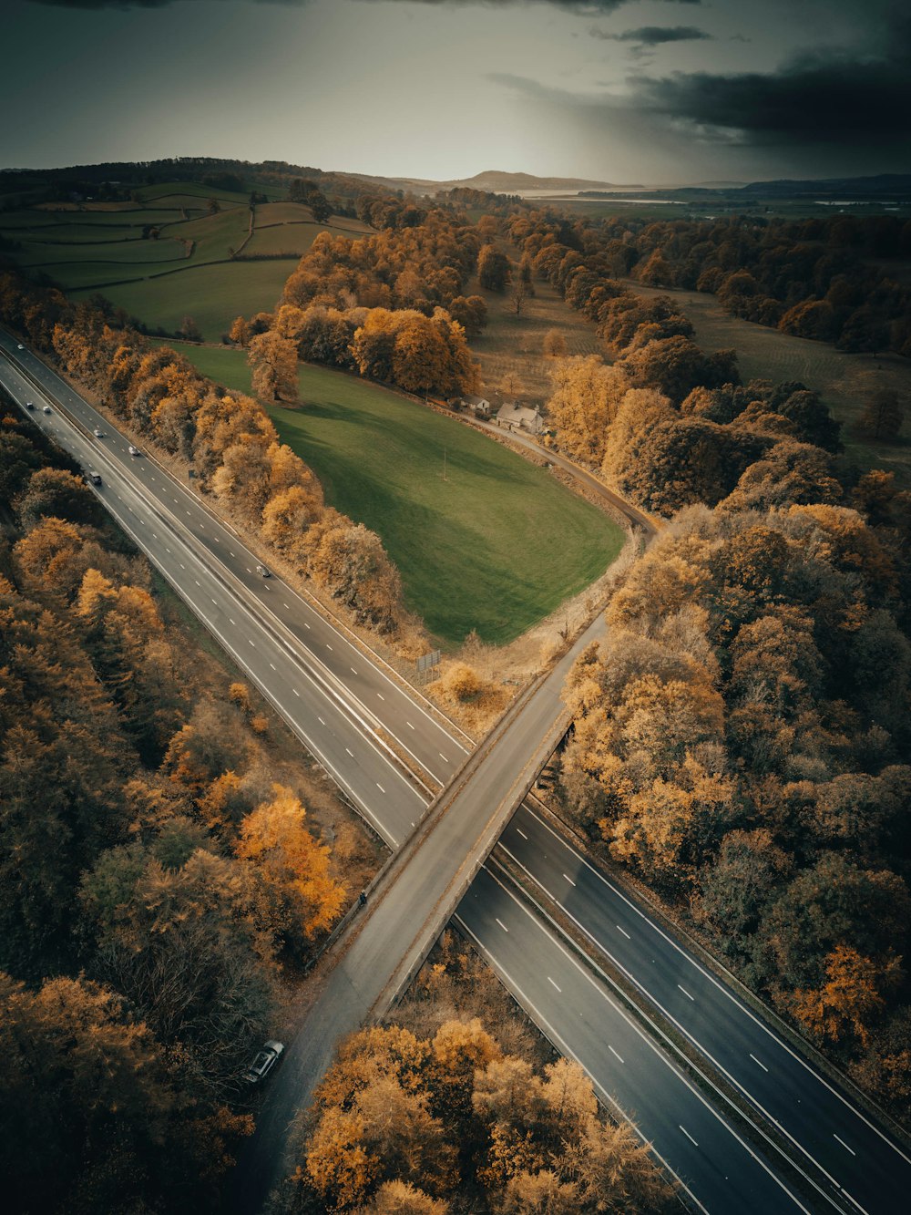 a highway with trees on either side