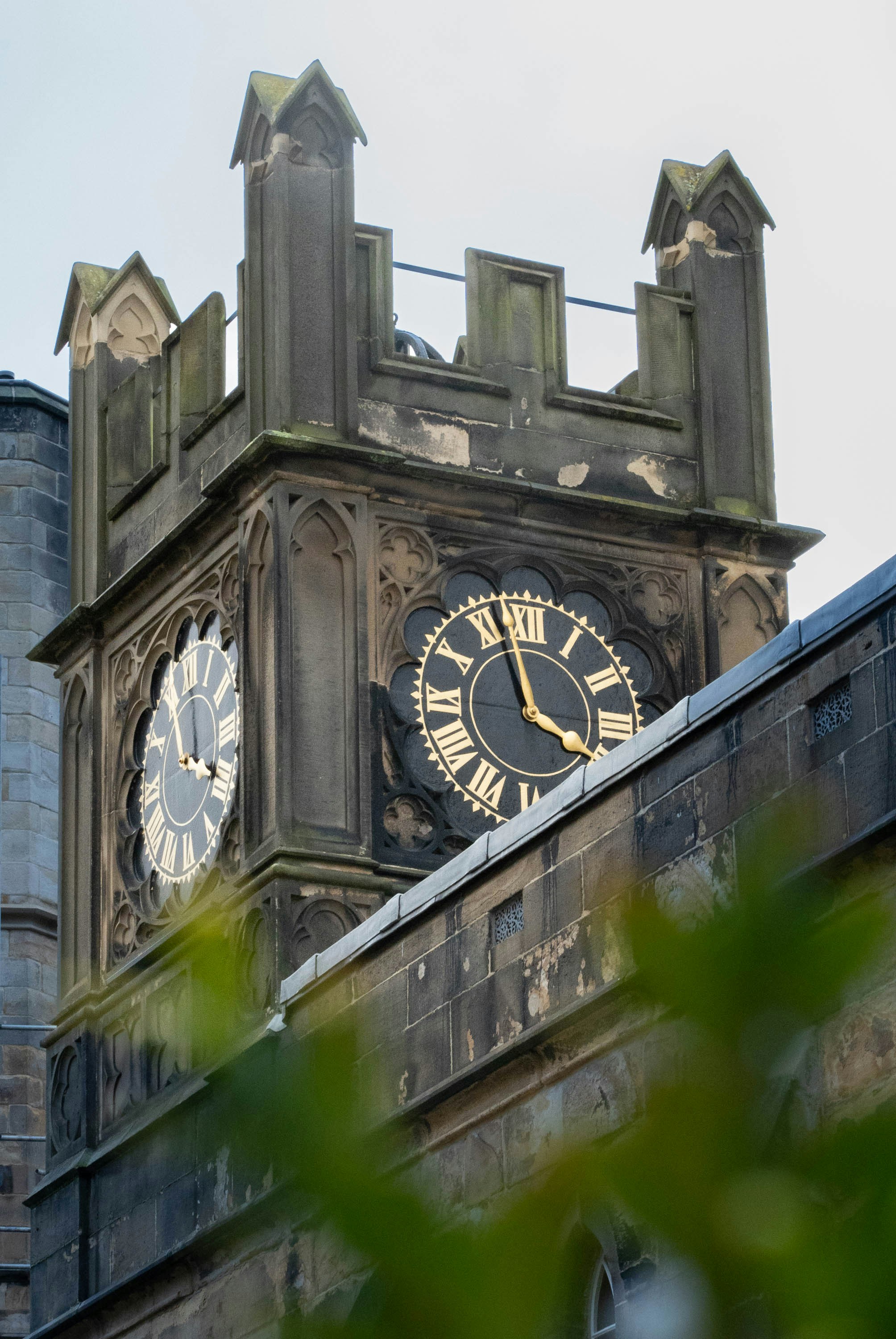 A clock tower with a couple of clocks on it photo Free Lancaster