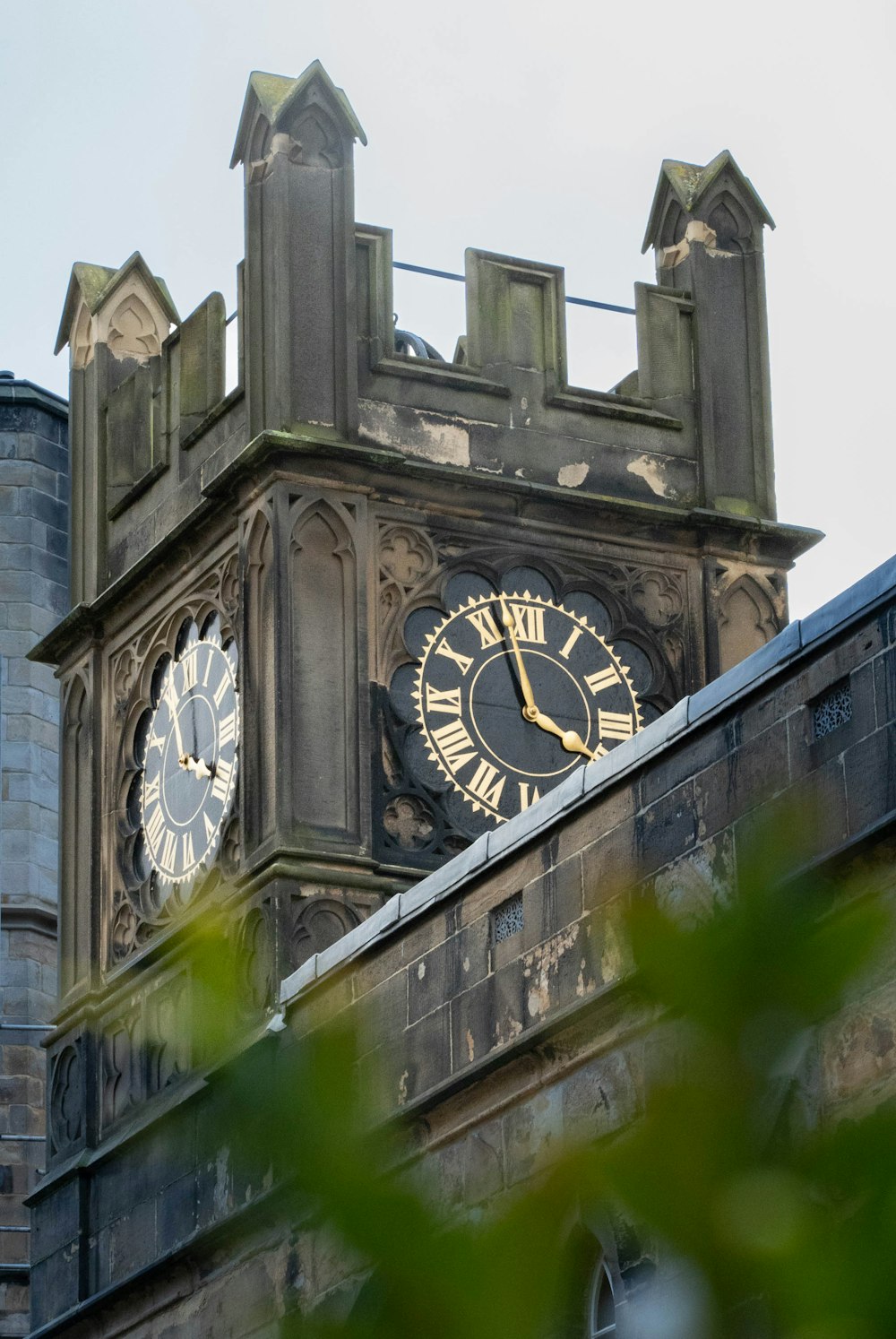 a clock tower with a couple of clocks on it