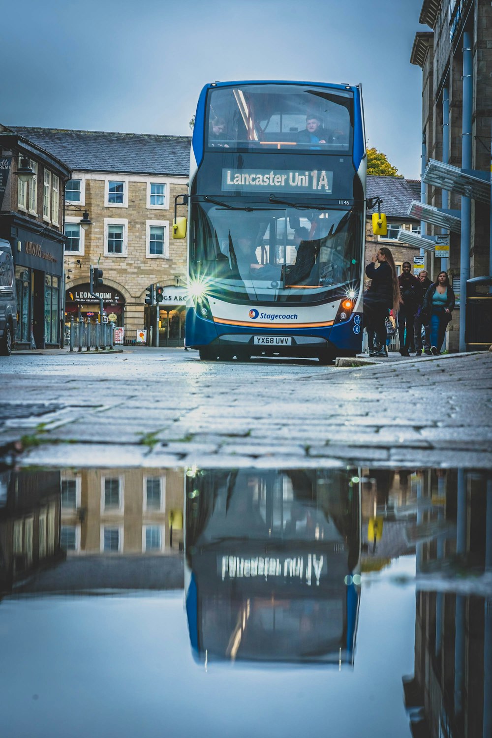 a double decker bus on a snowy street