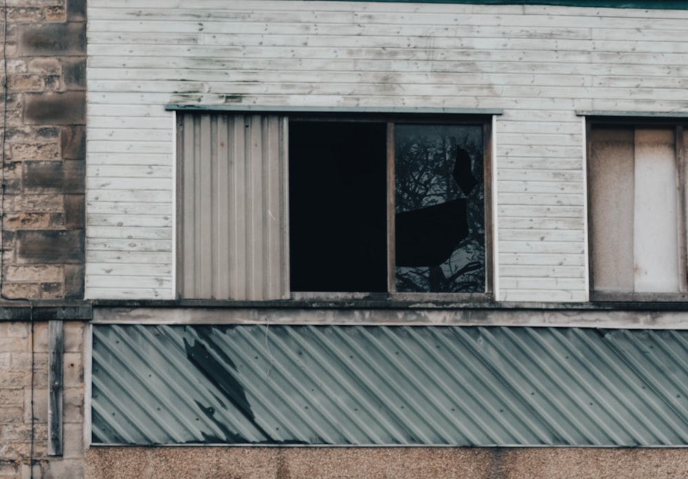 a building with broken windows