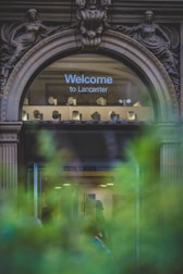 a glass door with a sign above it