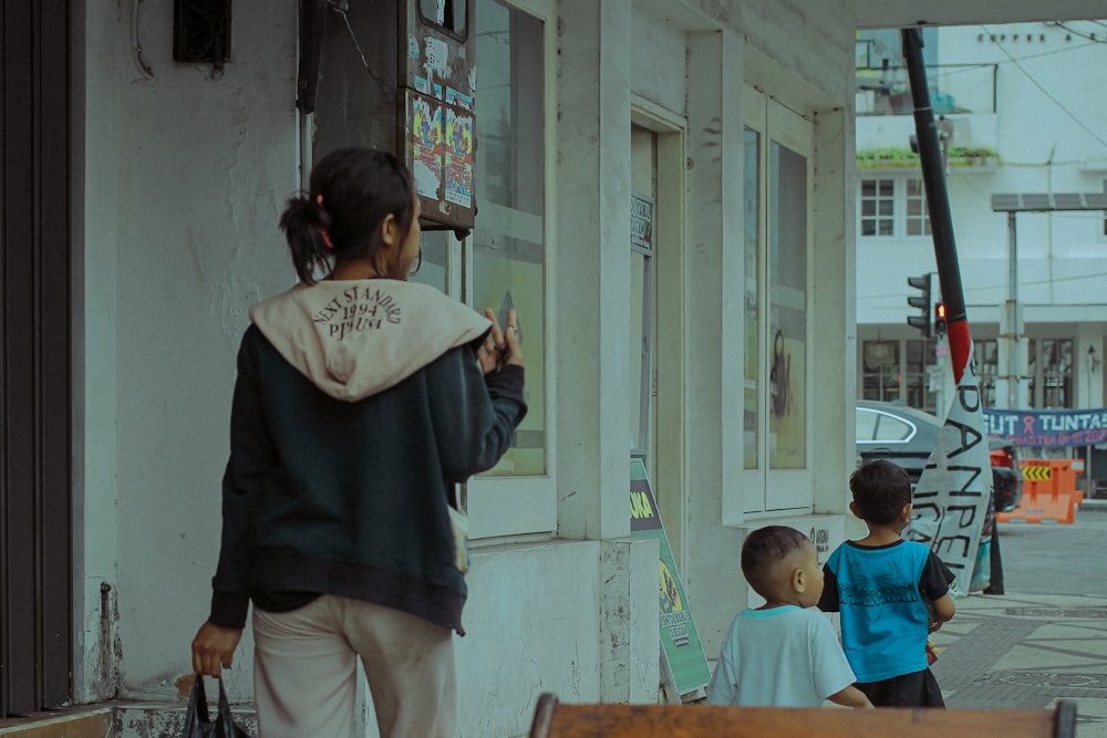 a man and two children