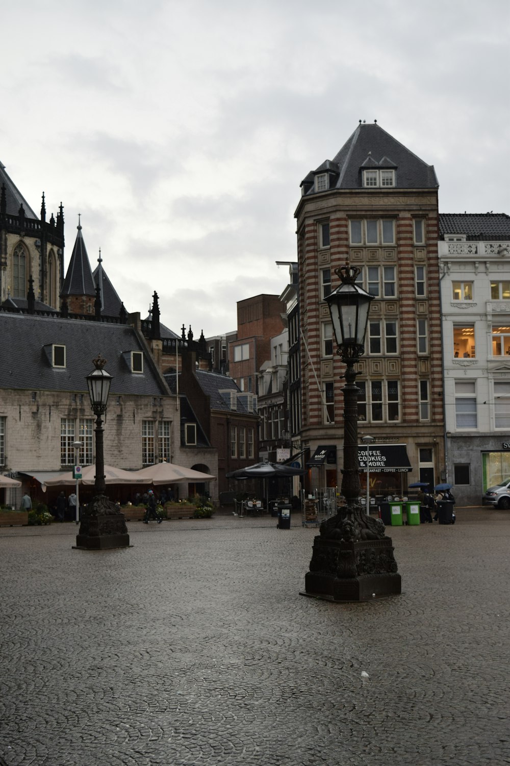 a stone street with buildings on either side of it