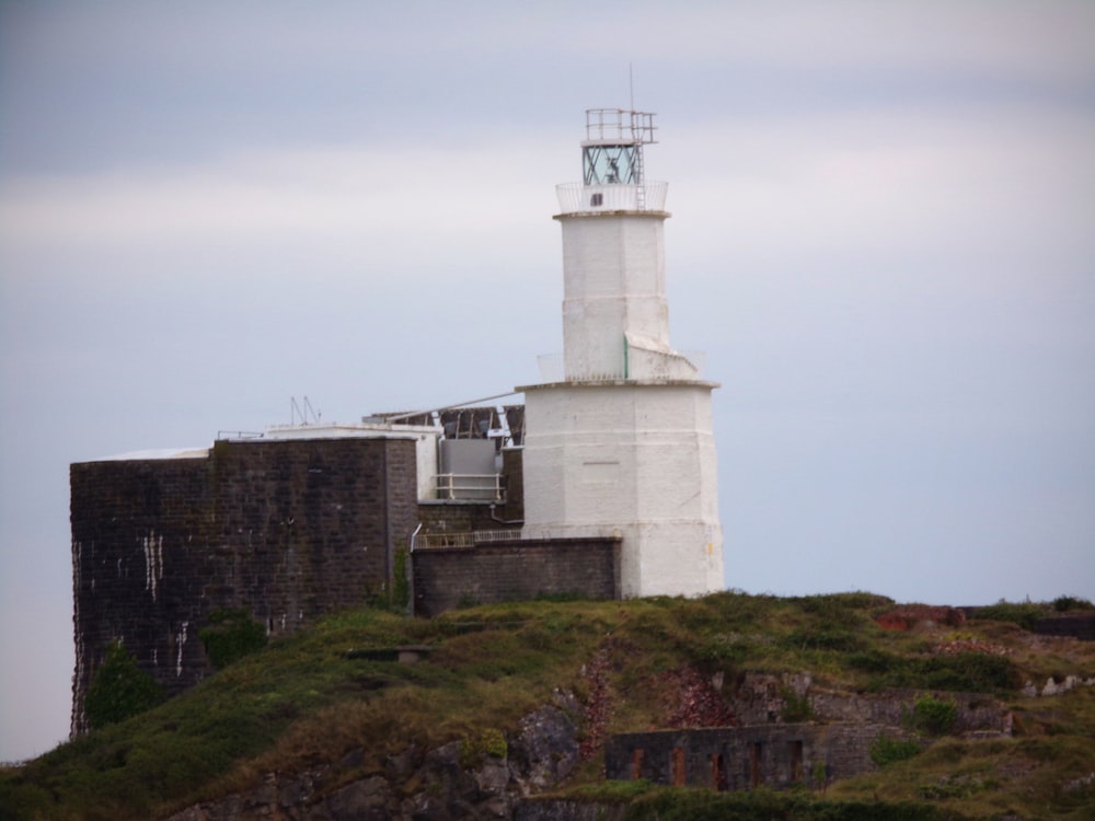 a lighthouse on a hill