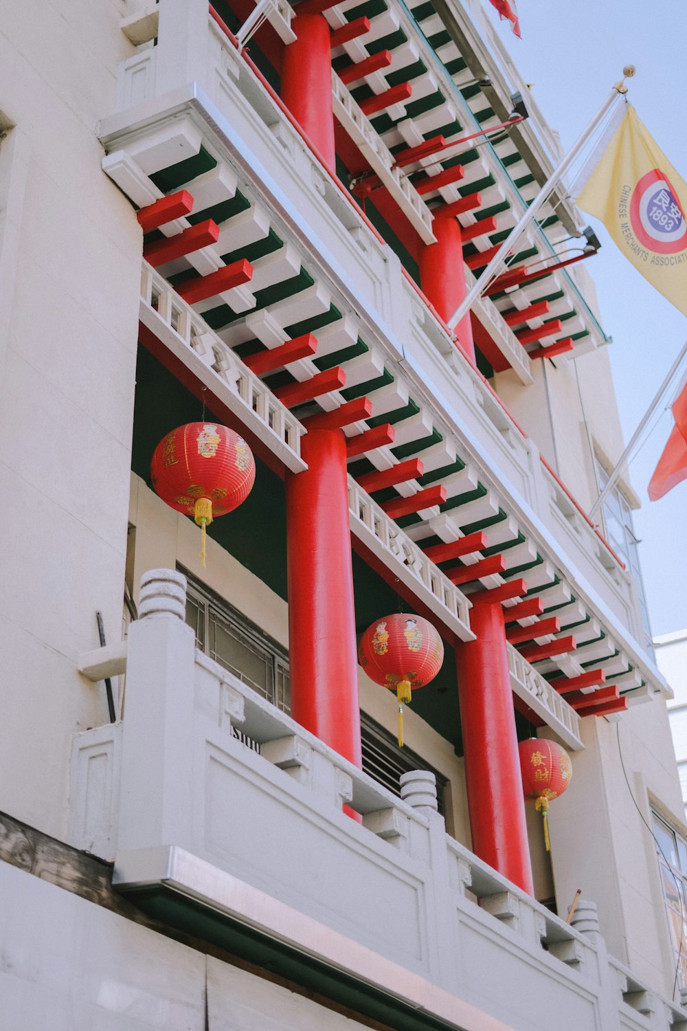 a building with red and white lanterns