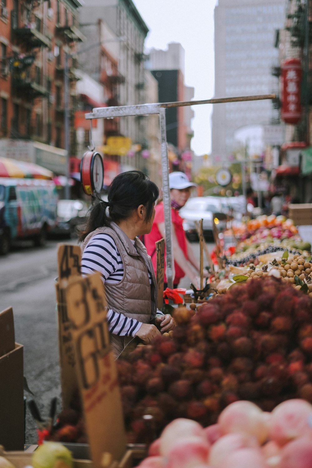 a person selling fruits on the street