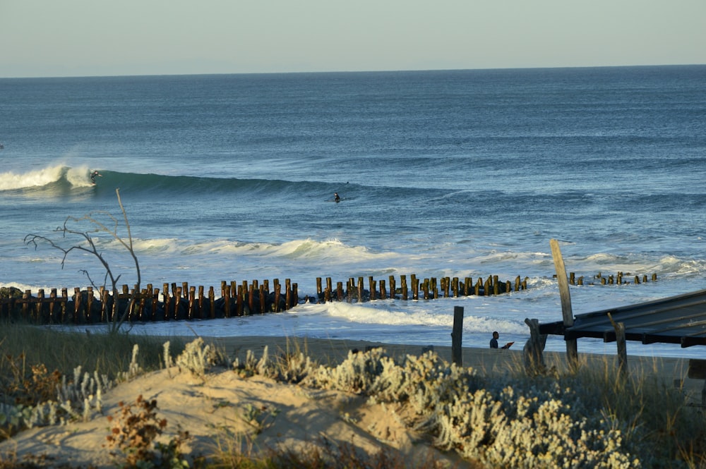 a beach with waves crashing