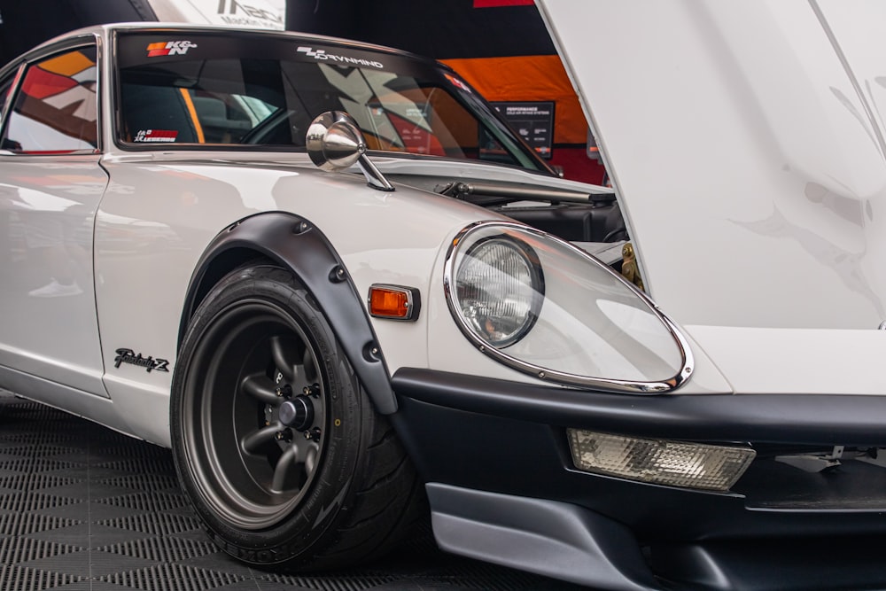 a white car with a black rim