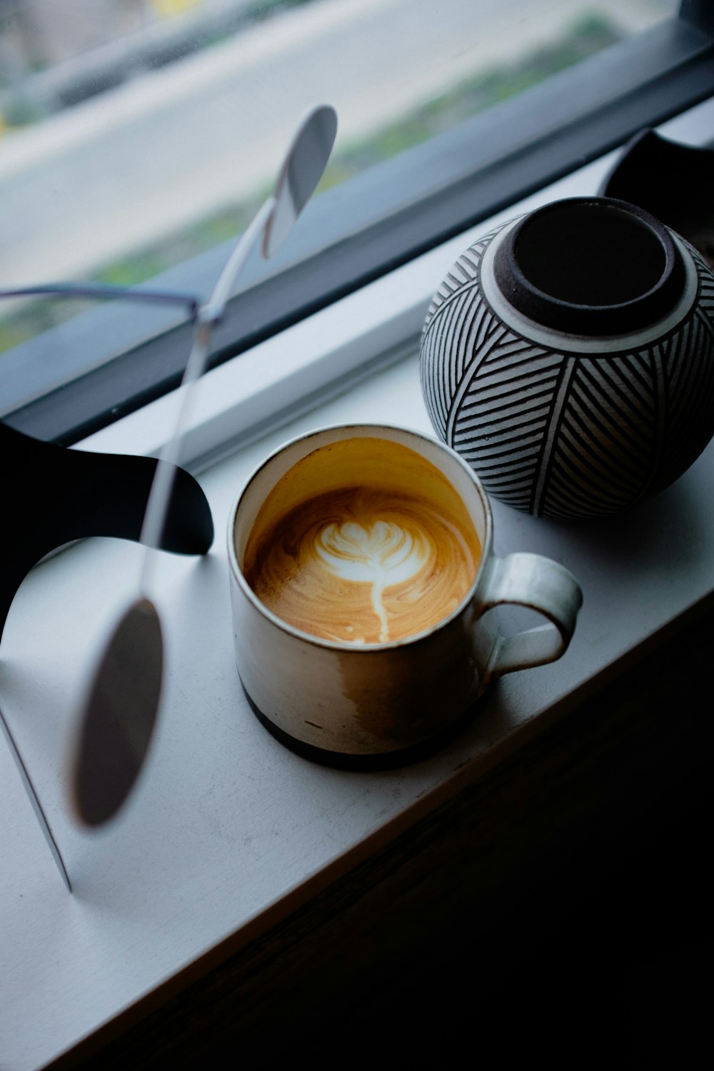 a cup of coffee on a table