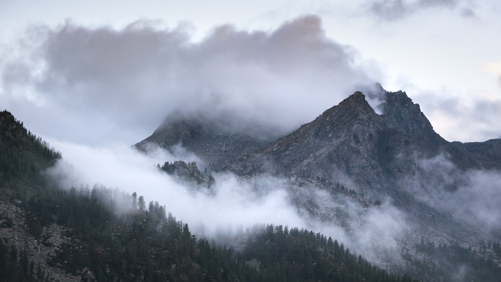 a mountain with clouds