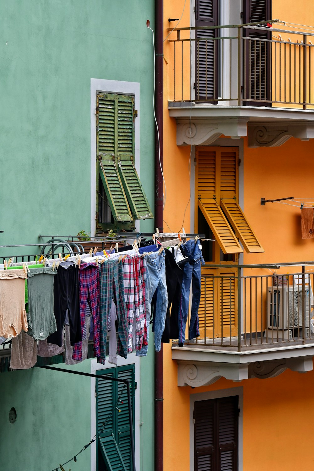 a row of clothes on a balcony