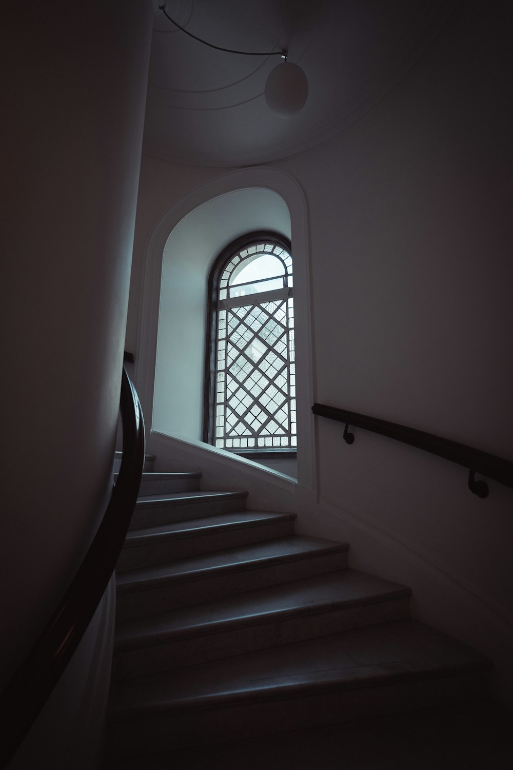 a staircase leading to a window