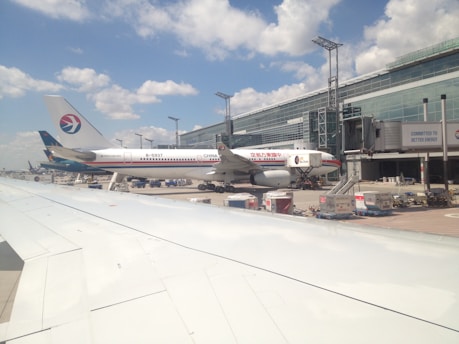 a couple of airplanes at an airport