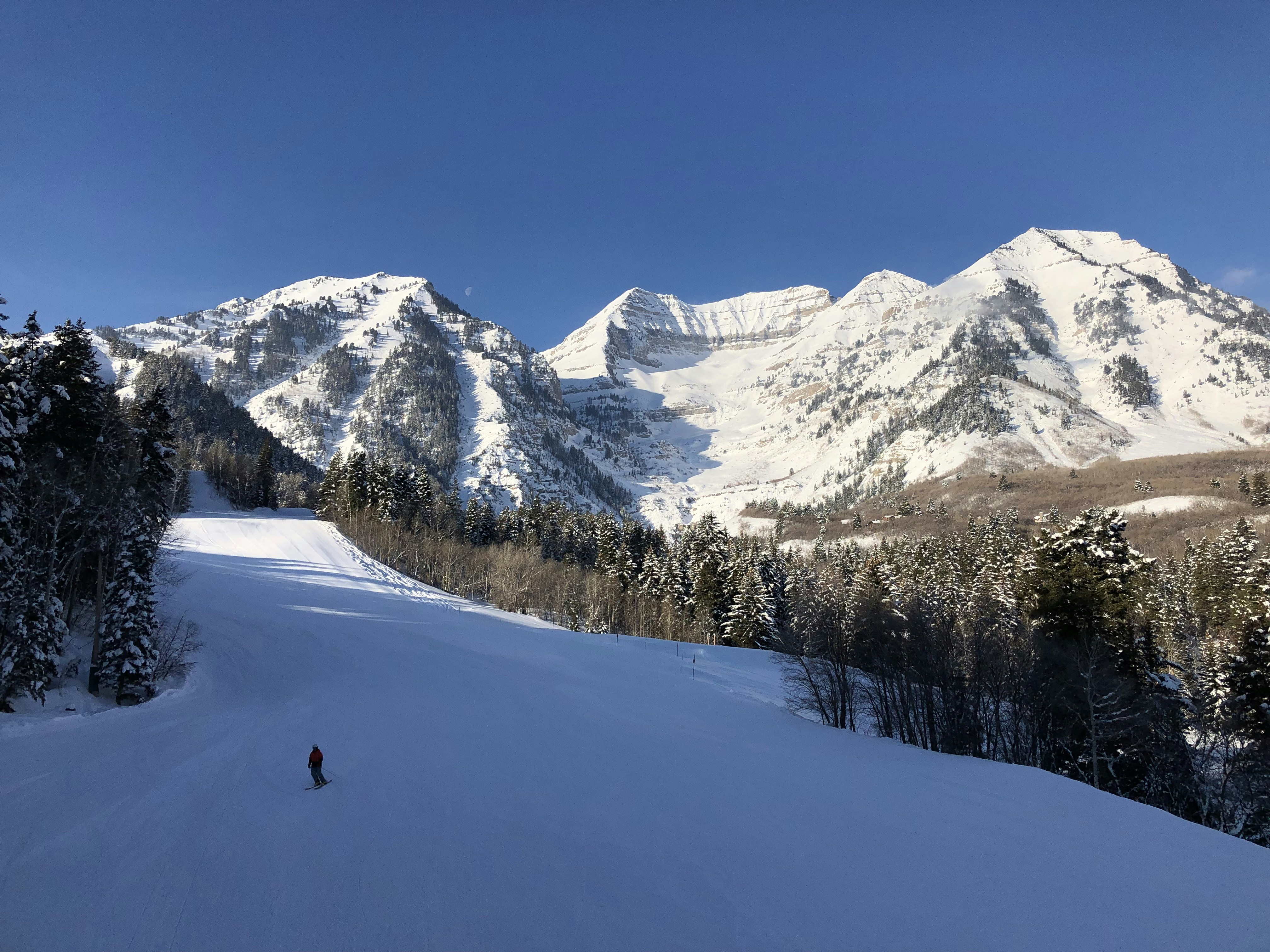 a person skiing on the snow
