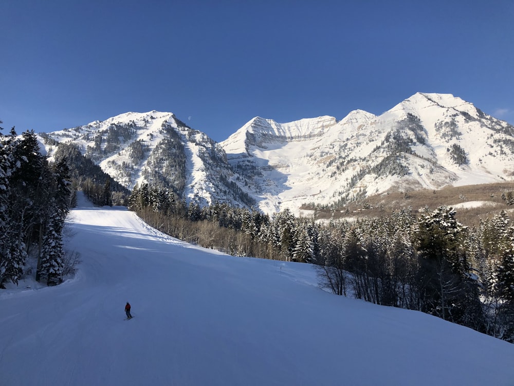 a person skiing on the snow