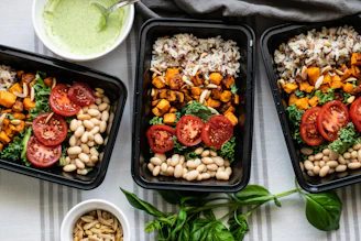 a group of trays with food