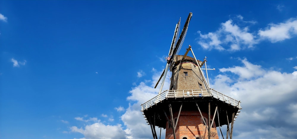 a windmill with a blue sky