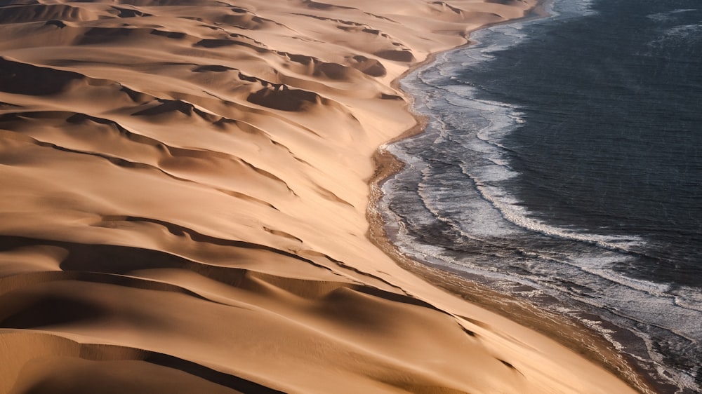 a sandy beach with water