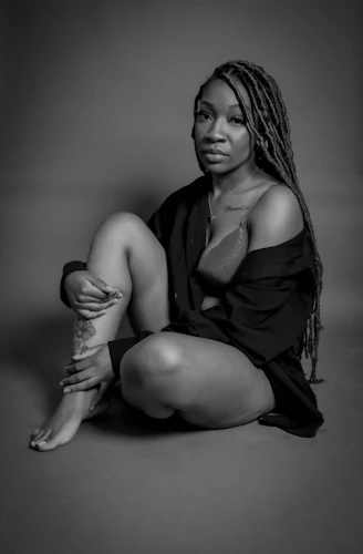 a woman sitting on the floor