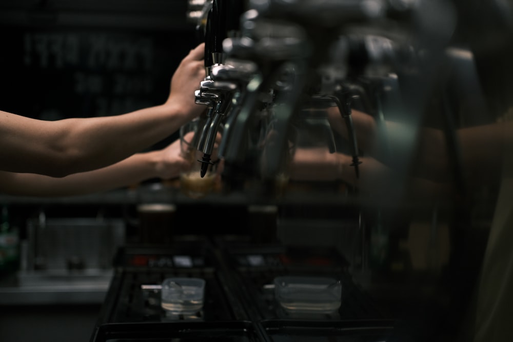 a close-up of a person working on a machine