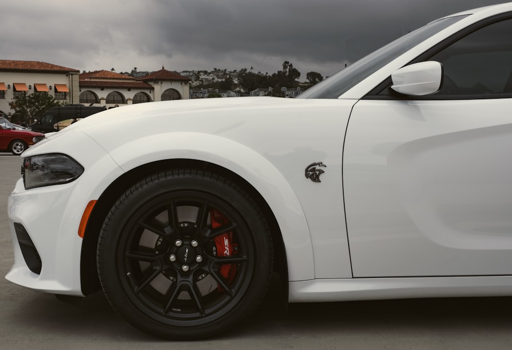 a white car with black rims