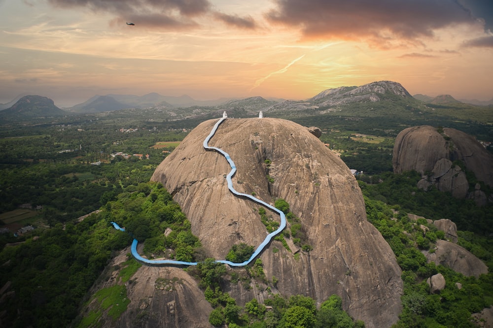 a winding road through a valley