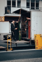 a person standing in a doorway of a building