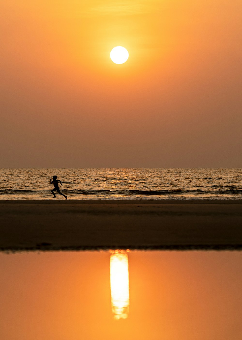 a person surfing on the sea