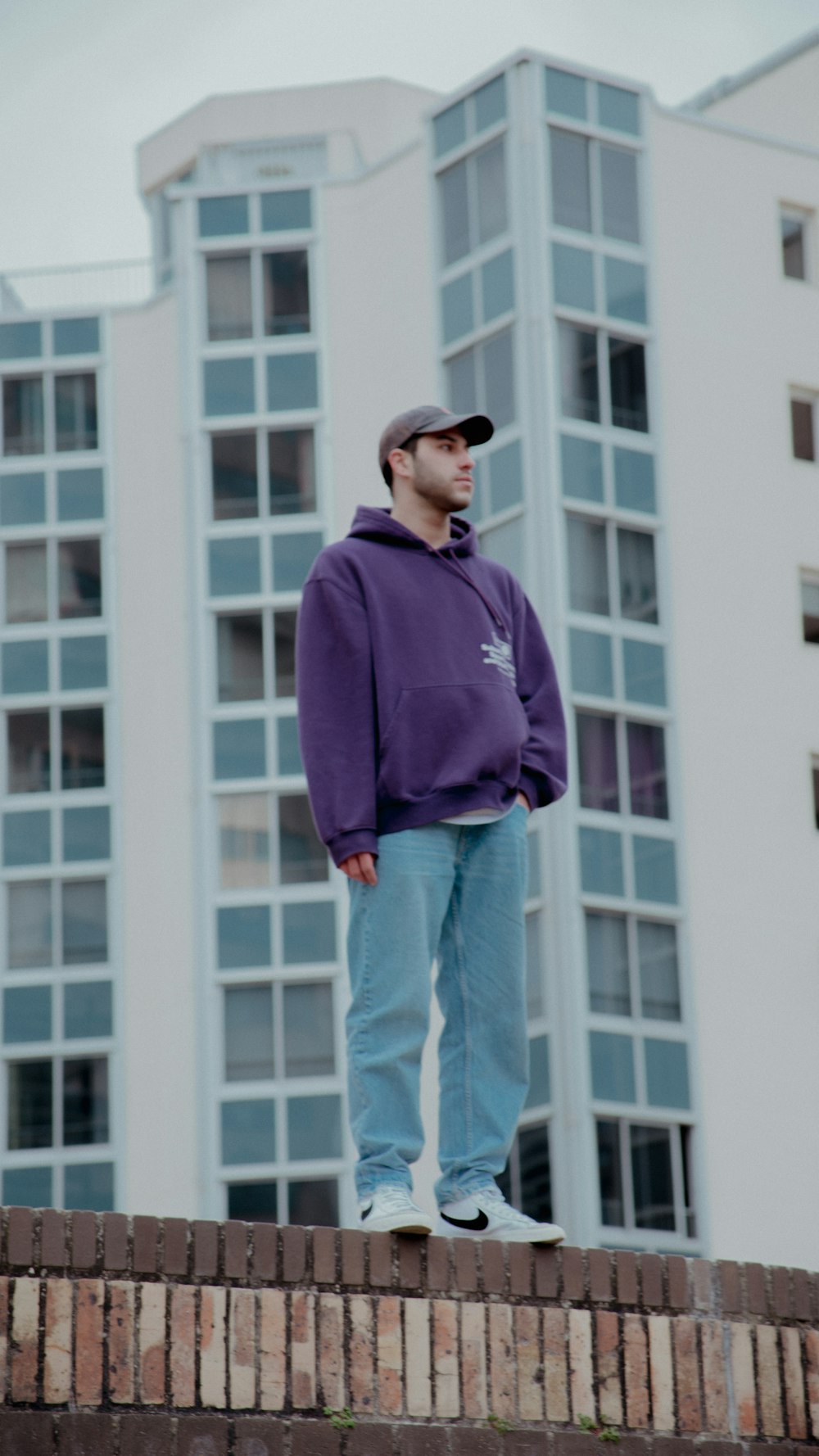 a man standing on a roof