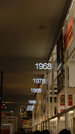 a group of people walking in a street