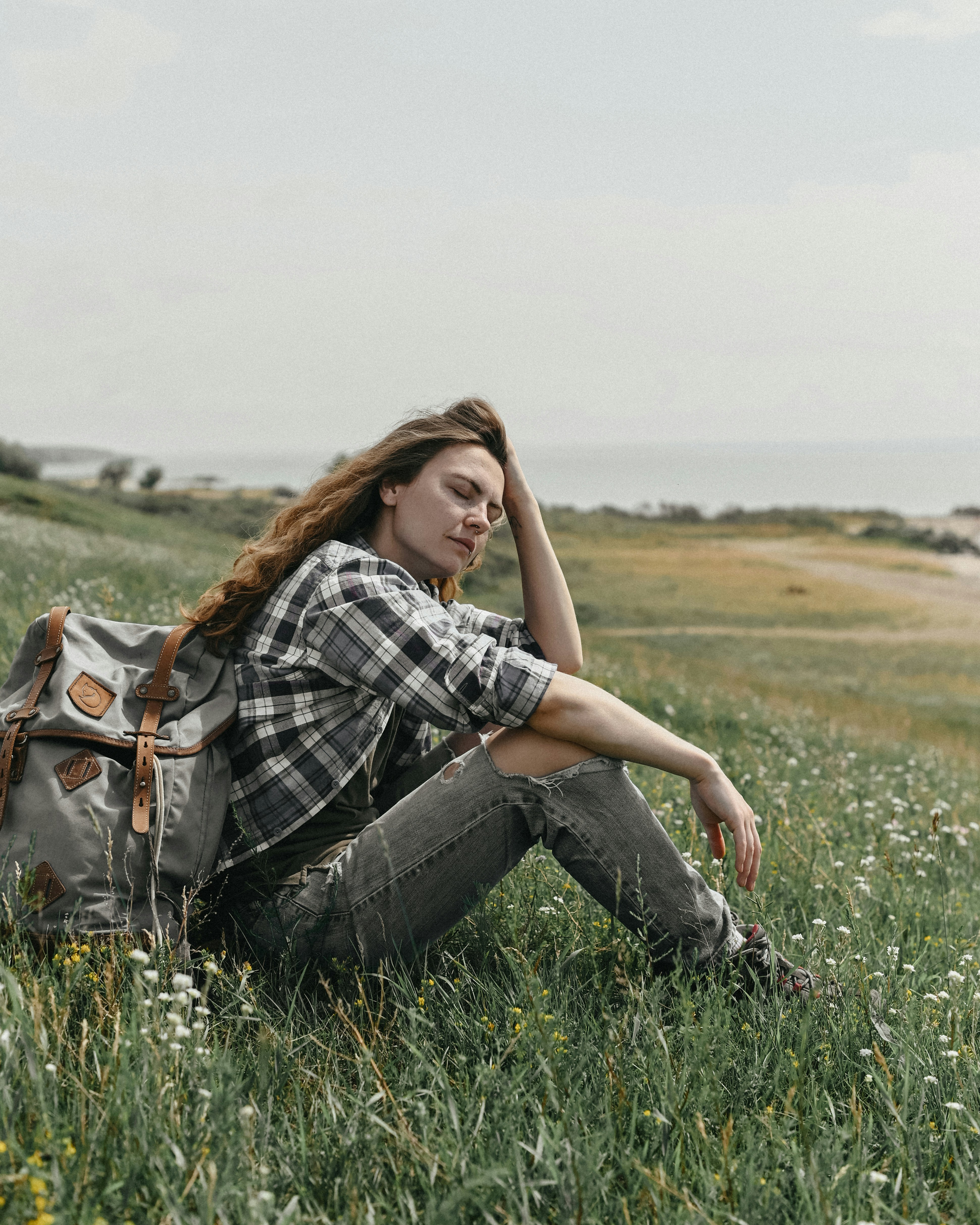 a person sitting in a field
