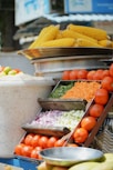 a group of vegetables in baskets