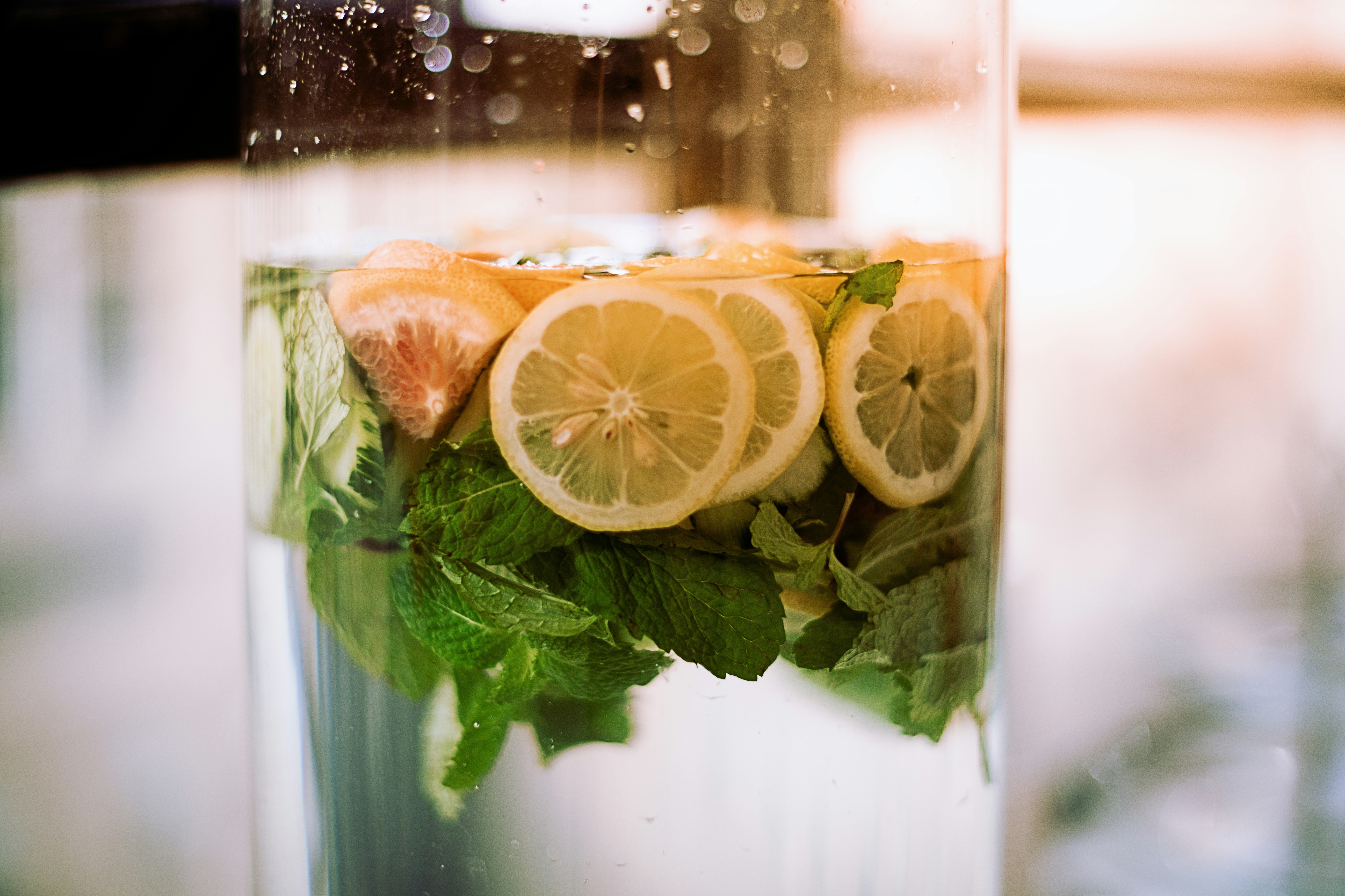 Natural ingredients for homemade sports drinks including lemons, honey, and sea salt - sports hydration drink recipes
