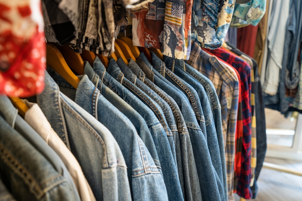 Jean jackets on display at a clothing boutique