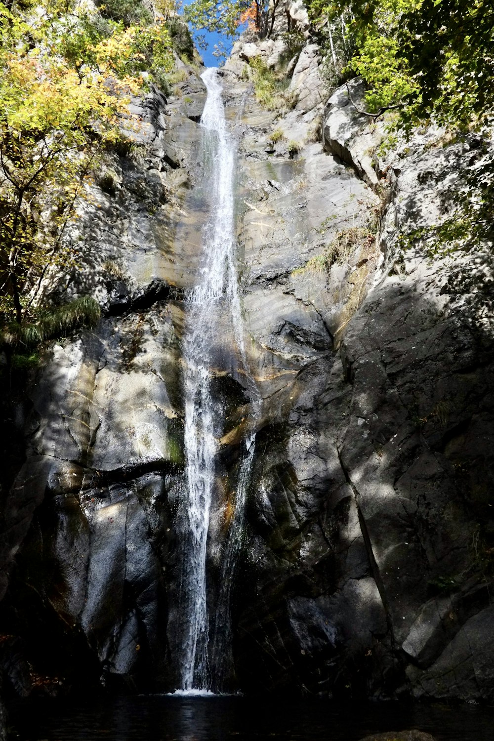 a waterfall over a cliff