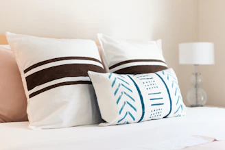 Set of pillows arranged neatly on a bed