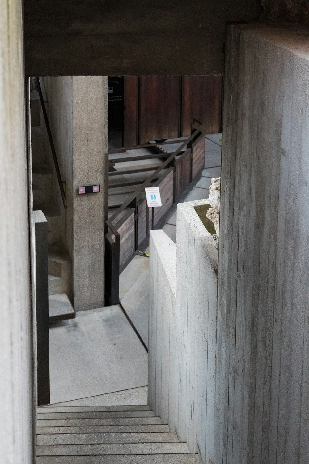 a staircase with wooden railings