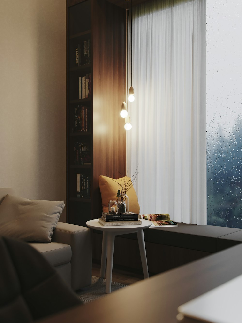 a room with a table and a shelf with books