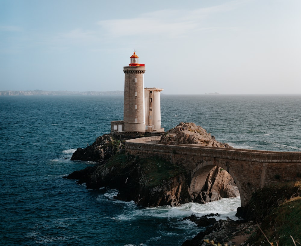 a lighthouse on a rocky cliff