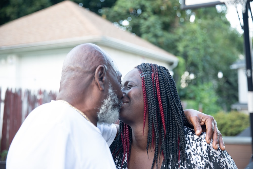 a man and woman kissing