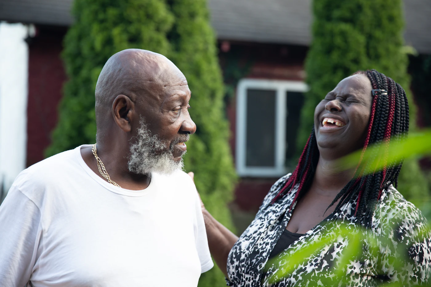 Smiling older couple talking outdoors