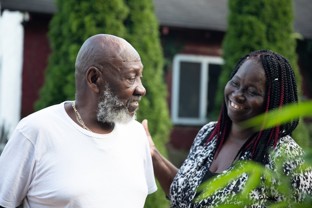 a man and woman smiling