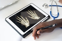 a person holding a tablet