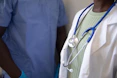 a person holding a stethoscope