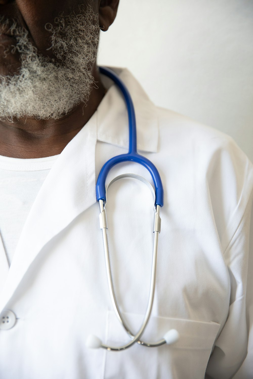 a man with a stethoscope around his neck