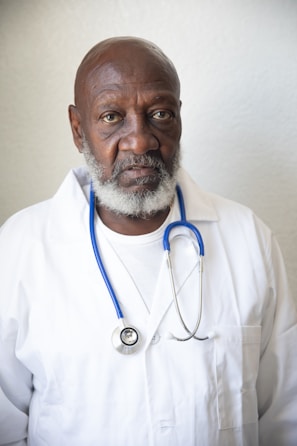 a man wearing a white lab coat