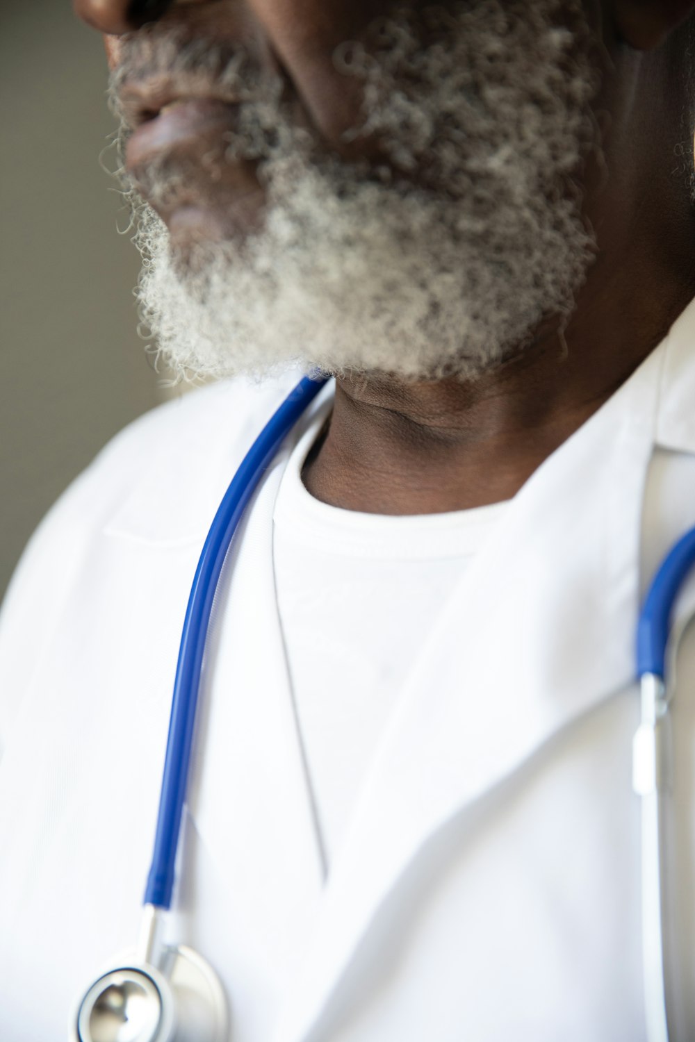 a man with a stethoscope around his neck